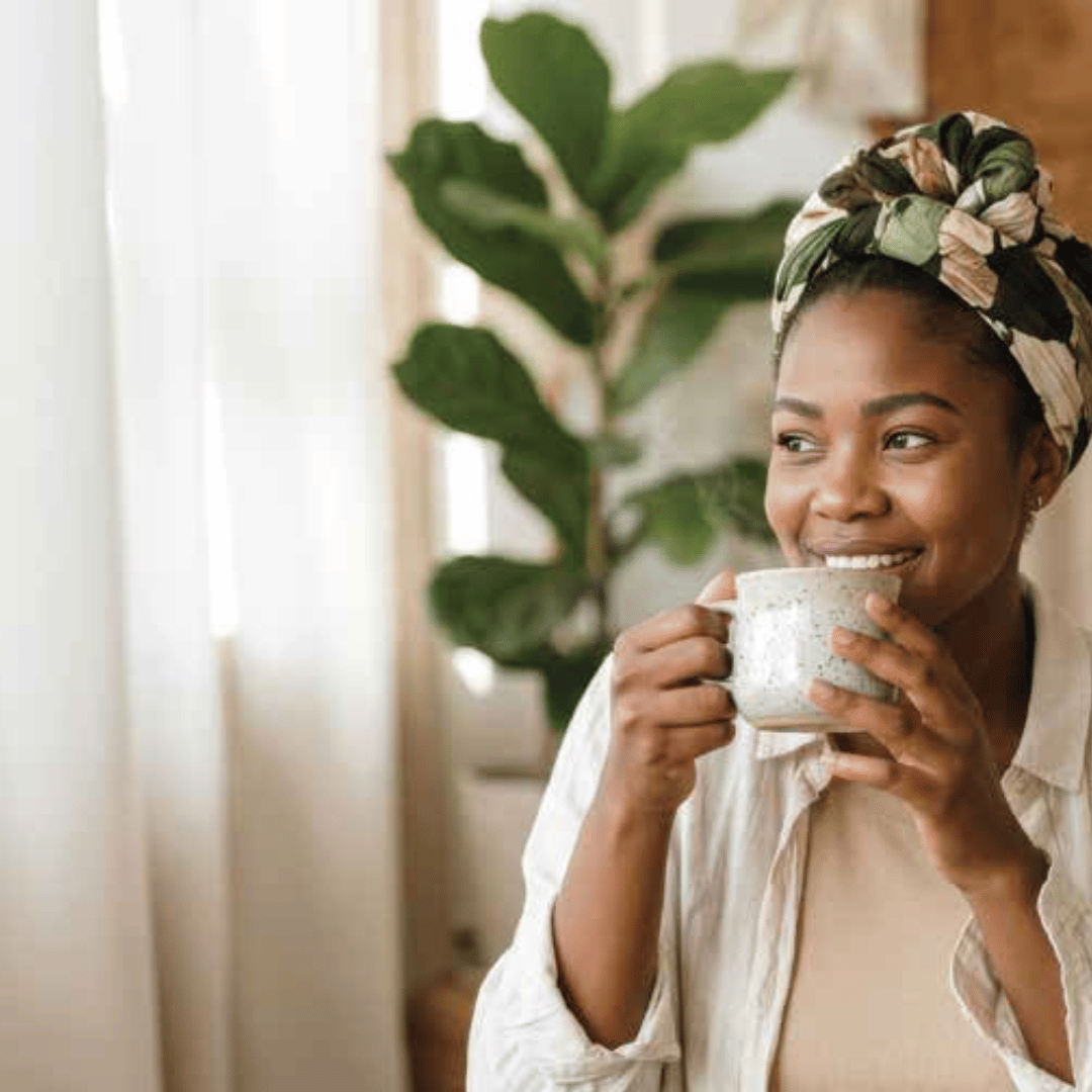 african woman drinking tea